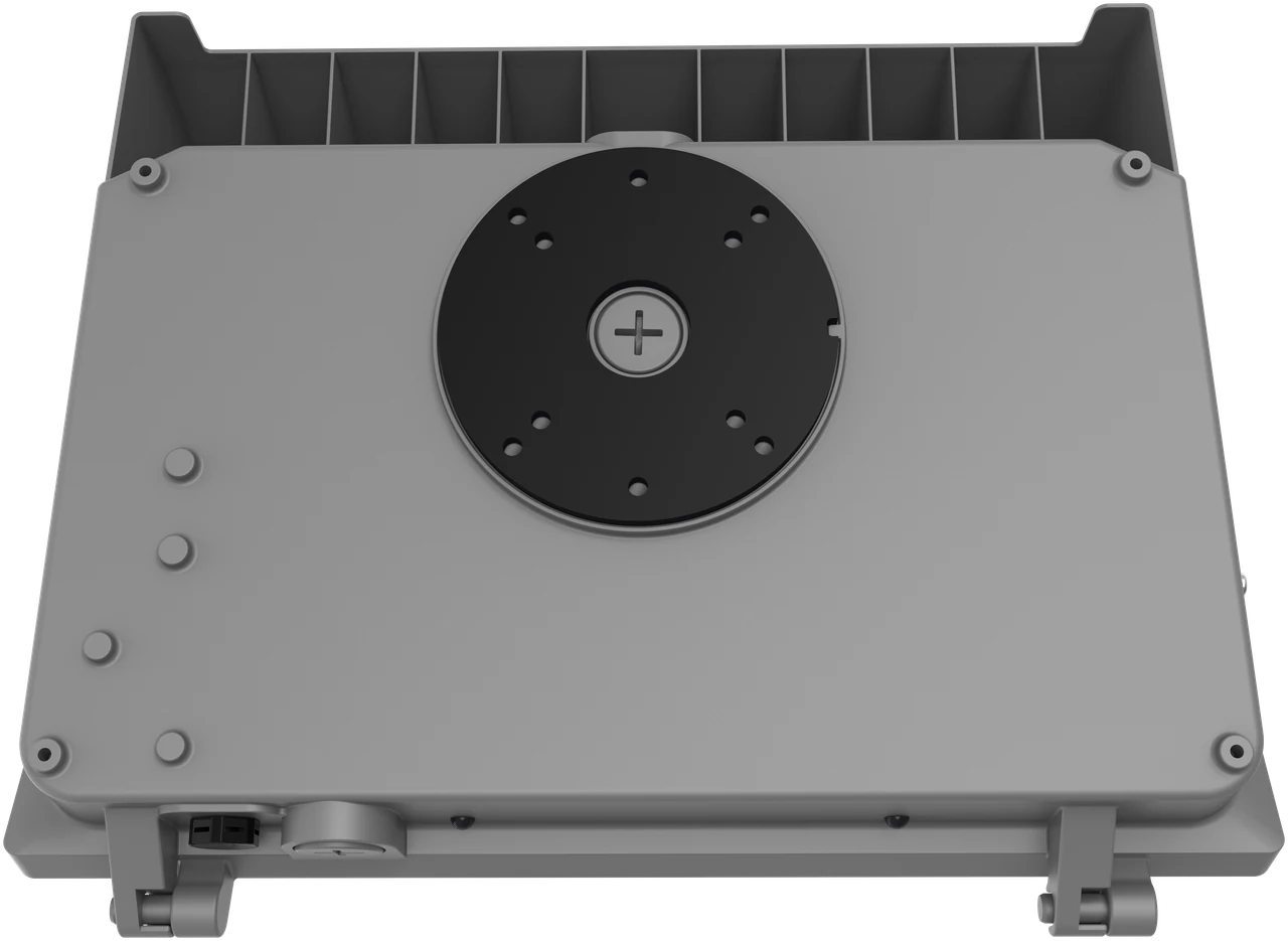 TAA Compliant badge alongside an ANSI C136.10 7-pin twist-lock receptacle on the top of the Abbey housing — federal procurement compliance and vendor-neutral photocontrol interface