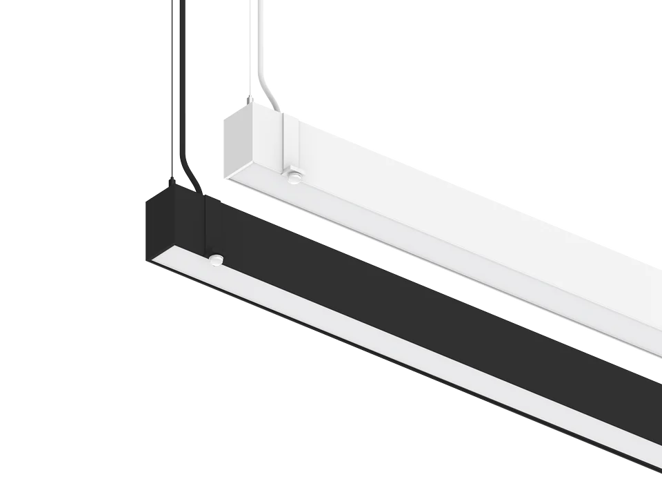 Luna architectural linear pendant in black-housing finish installed in an open-plan space — bridging into the contrⒶLS by ⒶCS controls platform with Bluetooth Mesh PIR sensors, J-box controllers, and kinetic wall switches qualified for the DLC Networked Lighting Control rebate adder