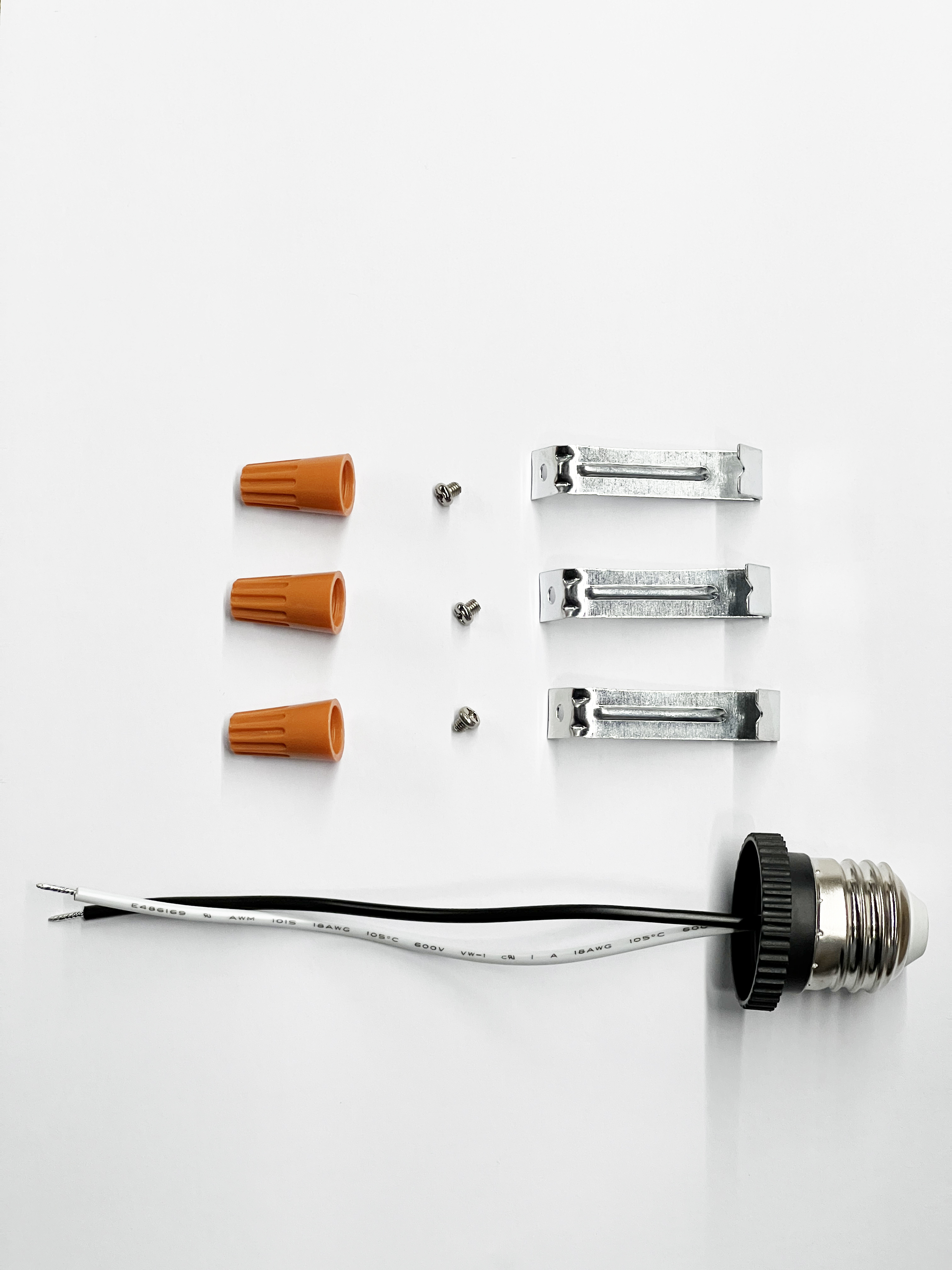 eCrescent dual-install conversion kit — spring iron supports + mounting irons + E26 base whip ship in box for both J-box surface mount AND 5″/6″ recessed-can retrofit, no separate accessory order required