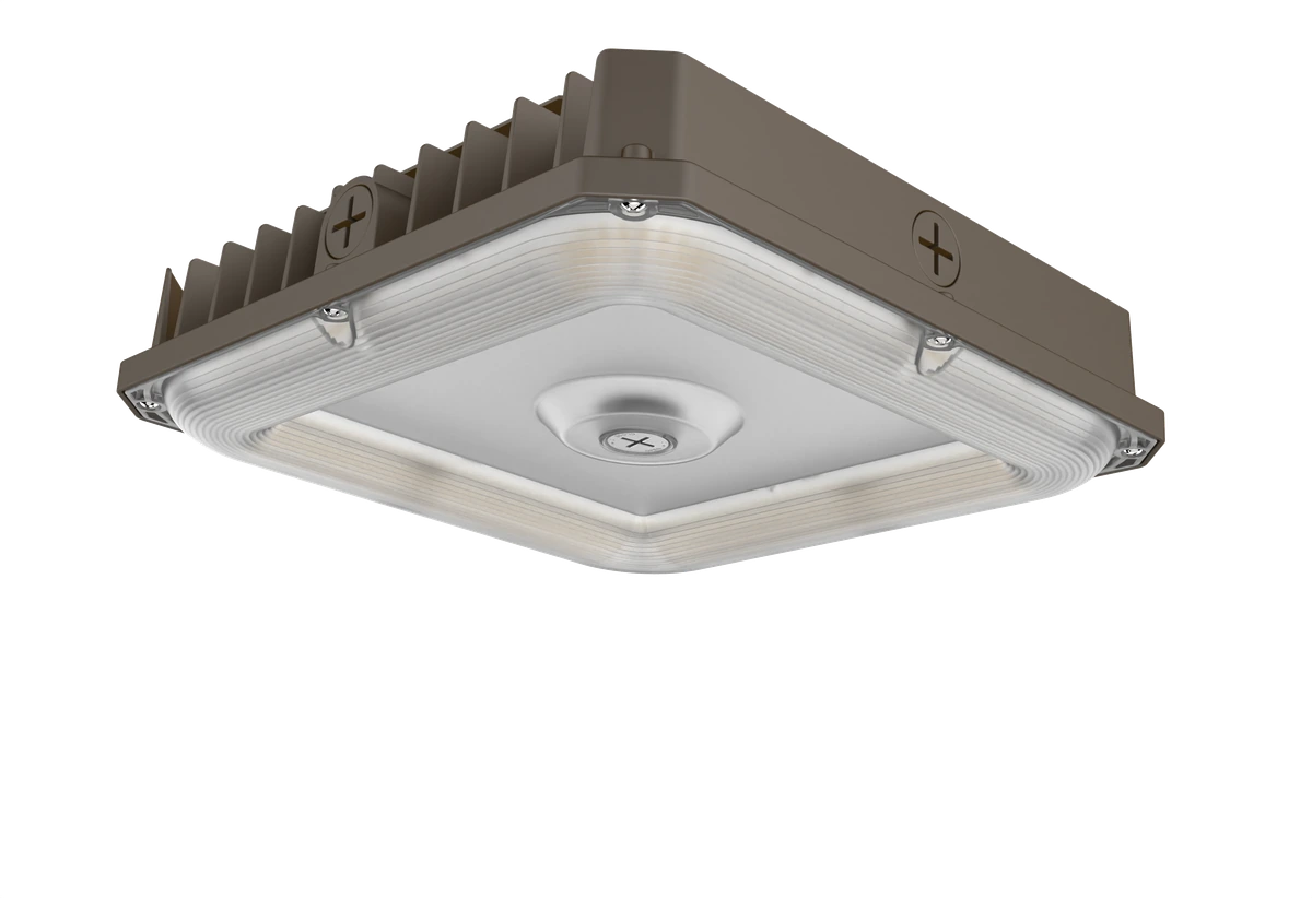 Navigator Series — top-down 3/4 angle view emphasizing the slim 2.73-inch profile, the channel-groove fin pattern across the heat sink, and the prismatic-edge UV-stabilized polycarbonate lens