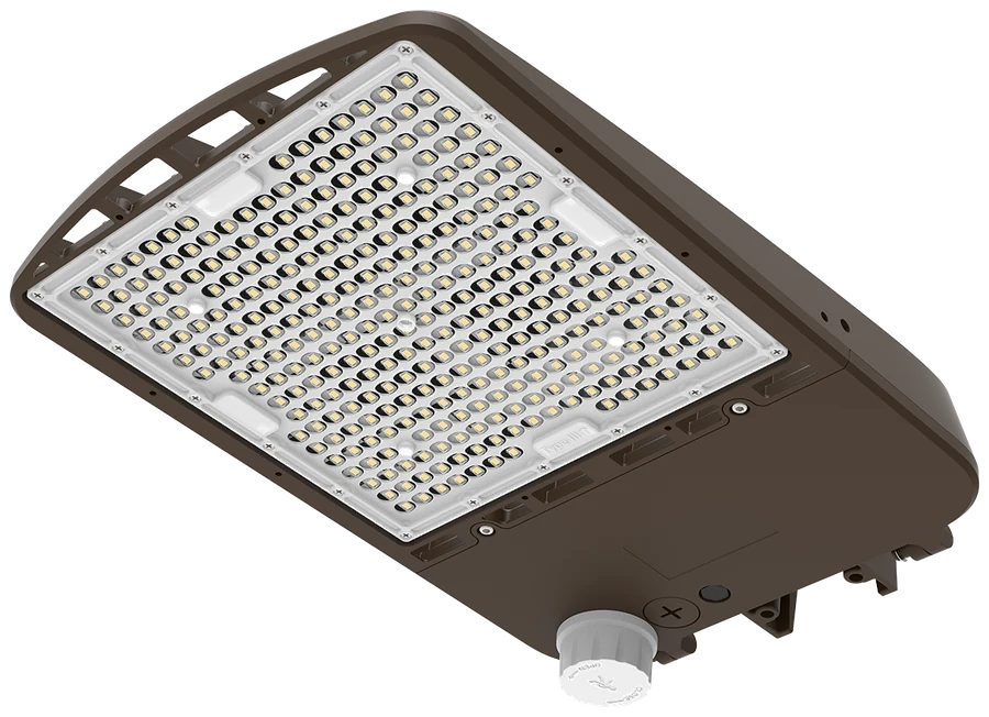 luxoⒶRCH Heritage — outdoor shoebox area light on slip-fitter pole mount, dark bronze, paired with Pathfinder canopy in parking-deck and drive-through layouts